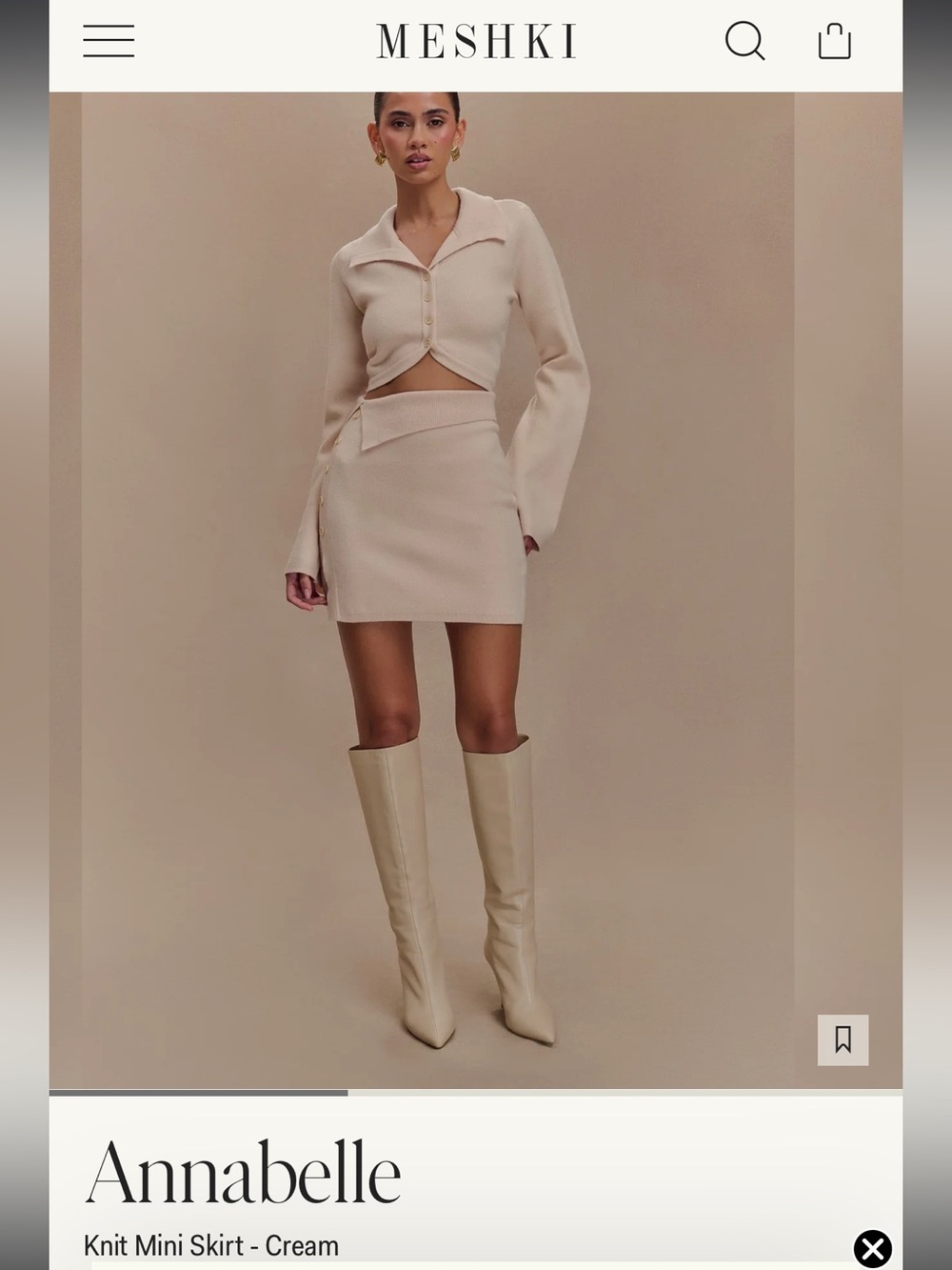 Meshki Cream Knit Asymmetric Mini Skirt